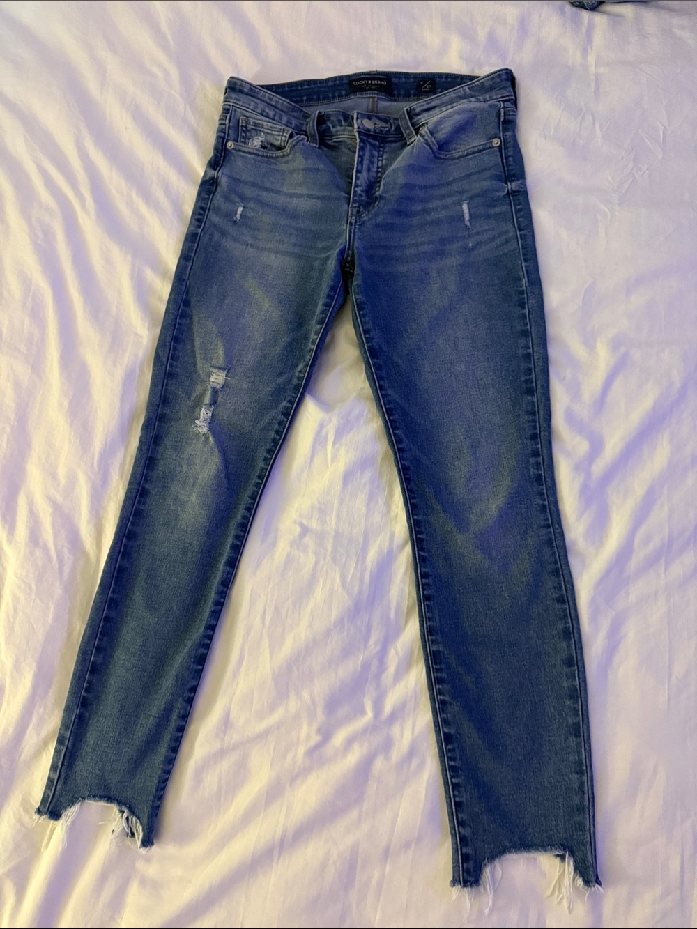 Lucky Brand Dark Blue Skinny Jeans with Distressed Ankles